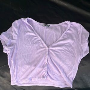 purple crop top with v-cut.